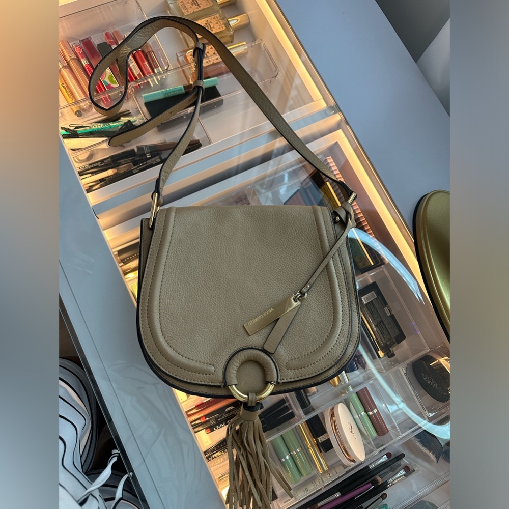 Vince Camino leather crossbody bag w/ tassel.